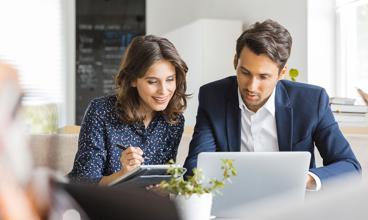 Business people working together at coffee shop Boost-Team-Collaboration